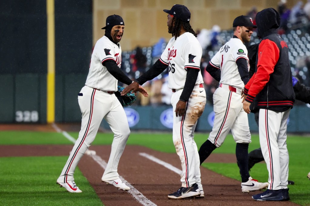 Twins endure a pregame power outage on a cold, rainy day to make for a happy home&nbsp;opener